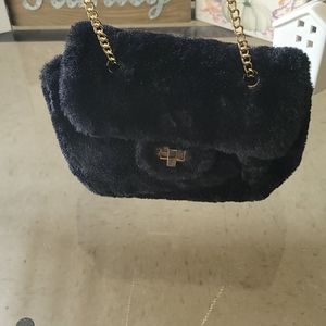 Mini faux black fur bag with gold shoulder chain